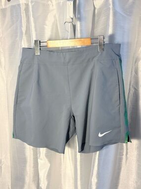 Nike Light Gray Athletic Shorts with Green Side Stripe